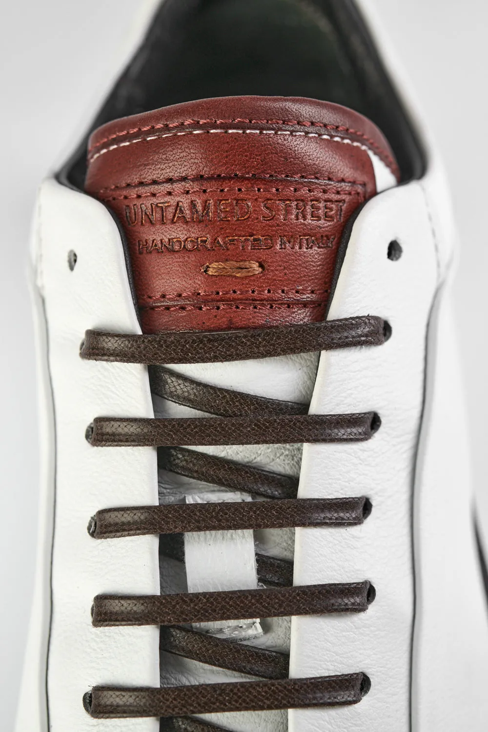 SOHO EDGE white chestnut welted sneakers.